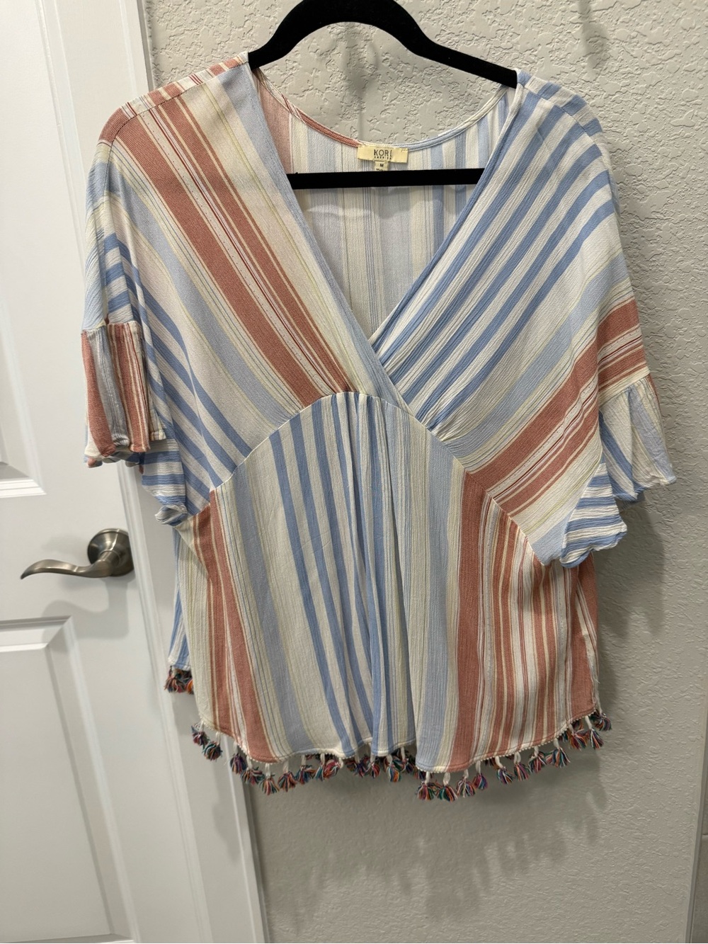 Kori Striped V-Neck Fringe Hem Blouse in Blue, Rust & Cream